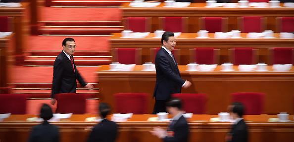 President Xi Jinping (right) and Premier Li Keqiang (left) arrive at the Great Hall of the People. © Feng Li/Getty Images
